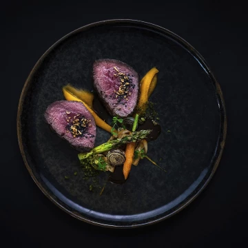 Dry aged beef tenderloin, foie gras, asperges, truffle teriyaki. Photographed for a new fusion restaurant MaSaMi near Amsterdam, The Netherlands. Had to play with the light to make all the colors pop out just the right way.