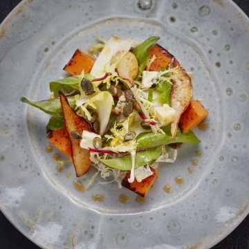 Another joy from the kitchen of Chef Adam Bennett at The Cross Michelin starred restaurant in Kenilworth, England.  It's a simple butternut squash, pear and seeds salad but with a combination of colours, textures and flavours that stand out from this talented chef!<br />
<br />
Restaurant: The Cross IG:@thecrossatkenilworth<br />
Chef: Adam Bennett<br />
Photographer: @jodihindsphoto<br />
Stylist: Chef & Photographer<br />
