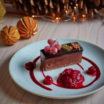 Chocolate on chocolate with sugared berries and compote - lovely velvety textures added to a lovely Christmas setting.<br />
<br />
Taken at Bronte Restaurant, The Strand @bronte_london<br />
Photographer: @jodihindsphoto