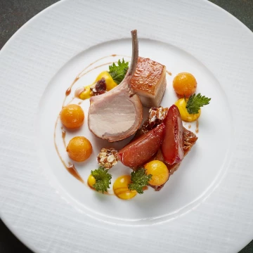 Gorgeous fresh spring dish from Ross Bryan at Corrigans, Mayfair.  This pork dish is full of incredible twists of flavours from the baked plums to the muesli balls. Really gorgeous..<br />
<br />
Restaurant:@corrigans_mayfair<br />
Owner: @chefcorrigan<br />
Chef: @rosspotsnpans<br />
Photographer: @jodihindsphoto