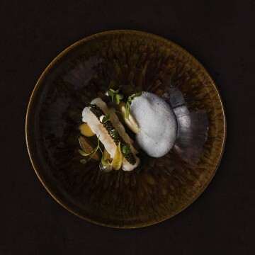 Langoustine /Caviar/textures of celeriac / Emulsion of Parmesan / Mushroom de Paris⁣ created by Dennis Huwaë of Restaurant Daalder in Amsterdam City Center.