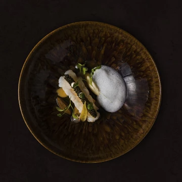 Langoustine /Caviar/textures of celeriac / Emulsion of Parmesan / Mushroom de Paris⁣ created by Dennis Huwaë of Restaurant Daalder in Amsterdam City Center.
