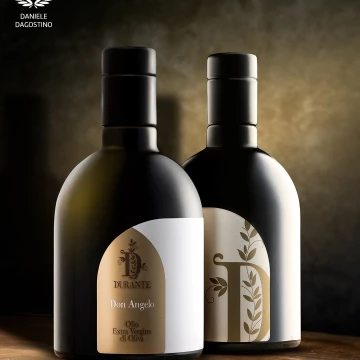Advertising still life created for a company that produces excellent Italian olive oil in Puglia.  Soft light and use of frost for a great gradient on the bottles.<br />
Shot by Nikon D810 and Hensel contra studio flash light.