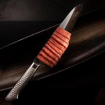 Wagyu is a very fine meat, thinly cut with a very sharp Japanese knife.<br />
Photographed for chef "Maruko" of "Unisushi resturant" in Cervia-Italy<br />
Shot by Nikon d810, Nikkor 24-70 and 3 studio strobe lights.