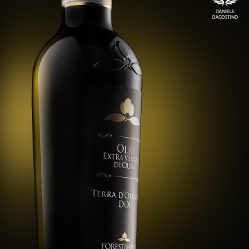 Low key still life. Soft gradient on the glass from the reflection of a frost panel.<br />
The dark glass shows a transparency by rim light on the left side of the bottle.<br />
Shot by Nikon d810+Nikkor 50mm 1.4 and 3 studio strobe lights.