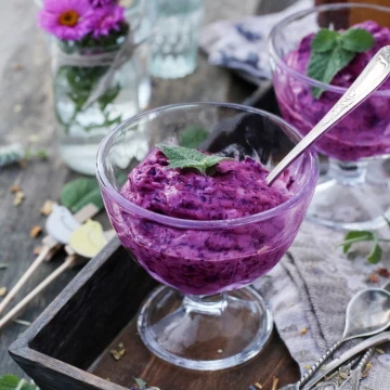 Blueberry ice-cream created for an Australian food magazine - the picture was taken in a hurry as I had only a few moments to shoot: ice-cream won't wait for you and melts fast, making it quite hard to photograph. The idea was to use natural light to make the picture bright and warm but also a little rustic, so it was taken on a wooden table in a garden.