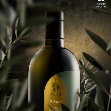 Extra virgin olive oil from Lecce, in Puglia, southern Italy.<br />
The real leaves reinforce the idea of ​​fresh oil, just out of the mill.<br />
Shoot by Nikon D810, 105 mm lens and 3 strobo lights.