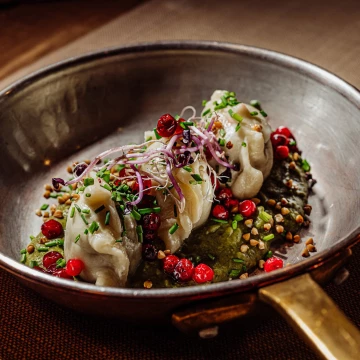 Pierogi with broad beans and mint, broad bean puree, pickled lingonberries, buckwheat popcorn, lovage olive oil at Bergo Restaurant in Szklarska Poręba - Poland.<br />
@marcin4funphotos<br />
@fotofoodie<br />
@restauracja_bergo<br />
@hotel_bergo<br />
@m.pilch1<br />
@chef_jadach