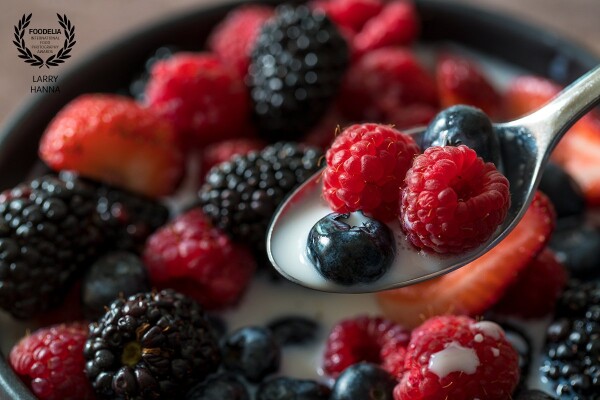 I love the bright colors and textures of berries, not to mention the taste.  This photograph was made using only window light in the kitchen of my home.