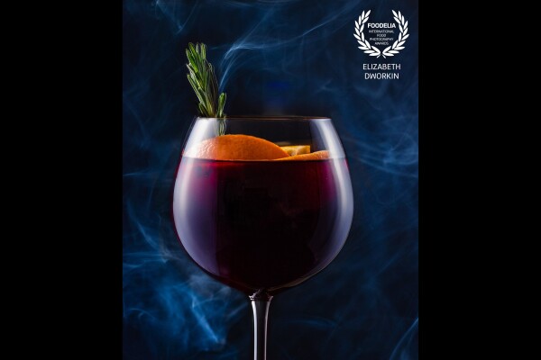 This rosemary-infused pomegranate blood orange mocktail was so fun to shoot. The smoke used creating a portable food smoker, turned blue without my intent. However, it helped make the image what it is. 