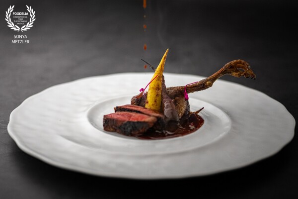 Squab Pigeon by chef Victor Garvey @solasoho<br />
Pigeons are trending :) <br />
Daylight soft box with a high shutter speed to catch the drops