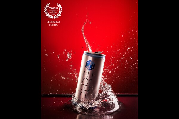Commercial photoshoot for "Pure Energy". The crystal clear energy drink. Clear, vegan and natural beet sugar. An incredible splash of freshness and action in the same shot. 