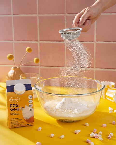 Photo shoot of the preparation  process of the dough using flour, sugar and egg whites. Egg white is a Latvian company @balticovo product.