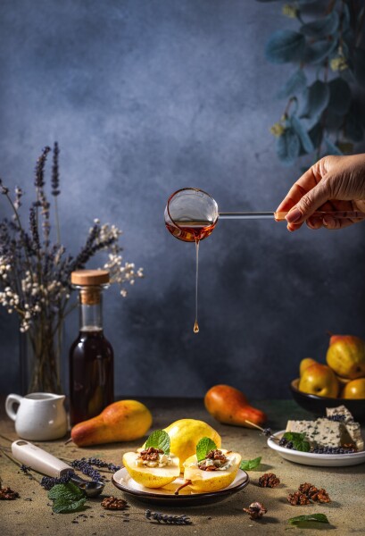 Pears with walnuts and blue cheese with maple syrup. Advertising photo for the production of maple syrup, a local Ukrainian business.