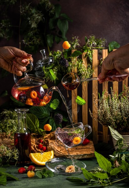 Berry tea with maple syrup. Advertising photo for the production of maple syrup,  local Ukrainian business.
