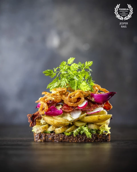 The famous danish "smørrebrød" - an openfaced sandwich. Picture is the bookcover for at new book "101 pierces of smørrebrød".