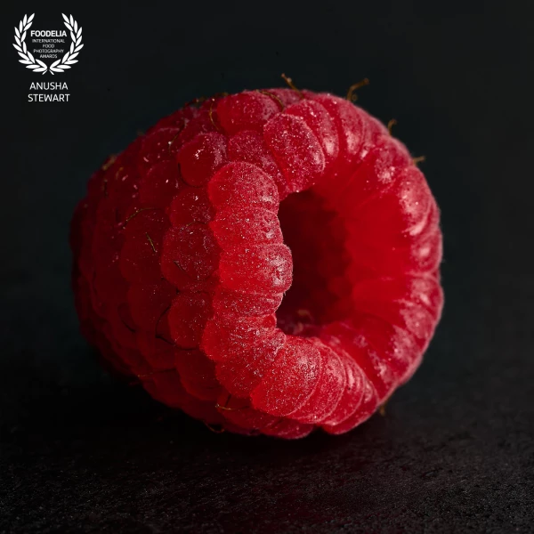 Moody raspberry - shot in natural light with a macro lens to showcase the humble raspberry.