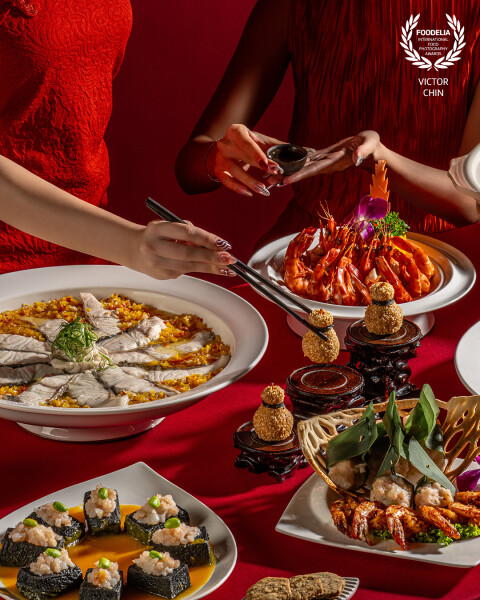 This photograph captures the heart of Chinese New Year: the reunion dinner. Shot for Sunway Resort Kuala Lumpur, it features an opulent spread of festive dishes symbolizing prosperity, unity, and tradition.<br />
<br />
With warm, inviting tones and thoughtful composition, this image celebrates not just the feast but the cherished moments of connection and joy shared around the table.