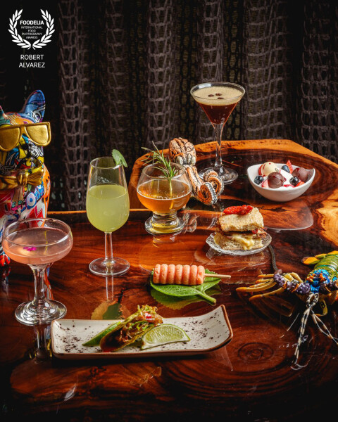 This photo captures a beautifully curated mini bites and cocktail pairing setup from Wild Kitchen in...