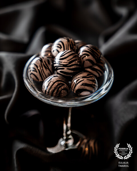 This is a photo of pralines by @kevinkugelchocolatier.

The praline is called “Miso Caramel” – a m...
