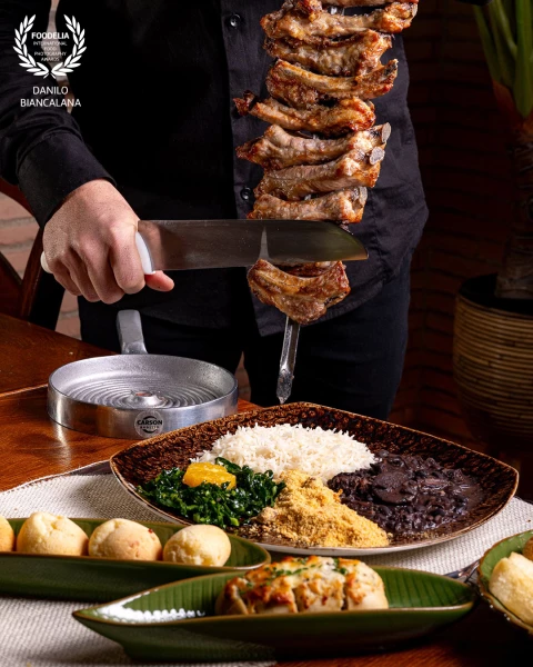An interesting moment captured during a Brazilian-style dinner