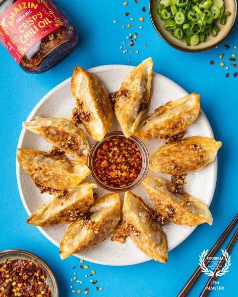 Playful dumplings featuring the first-ever organic crispy chili oil in the market, shot for Amaizin....