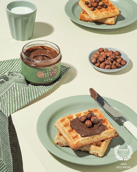 Crispy golden waffles topped with silky hazelnut cream – a perfect balance of texture and flavor in...