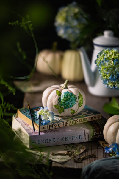 Blue hydrangea and some pumpkins