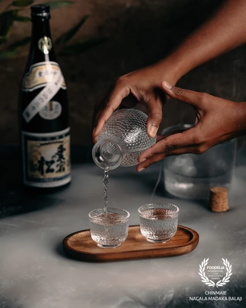 Warm Sake on a cold evening- a quiet comfort that seeps into the moment.