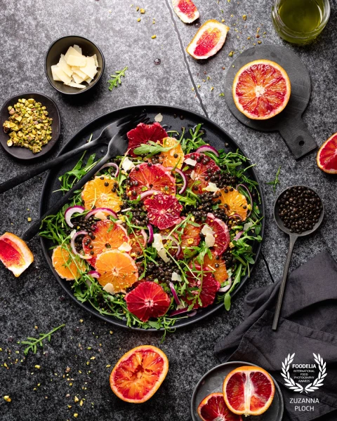 Winter jewel salad. Celebrating the vibrant beauty of winter citrus. The precise arrangement of crim...