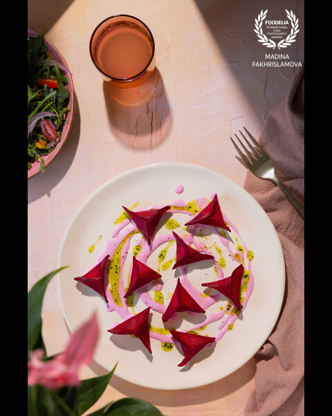 Beet ravioli with a palette of vibrant sauces