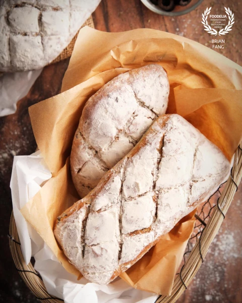 More than a loaf of bread, this photograph captures the quiet dedication behind artisanal baking. Ev...
