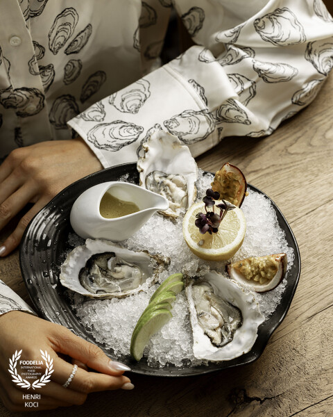 A moment of precision and freshness oysters brought to life with a single squeeze of lemon. Captured...