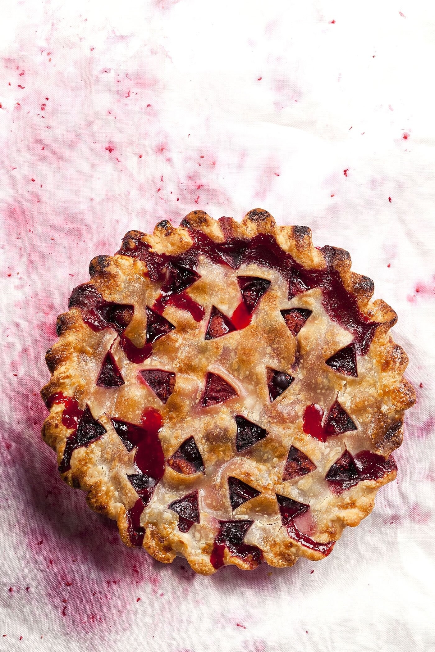 This Berry Pie was photographed out of season for a summer publication. A challenge in Alberta Canada! I made the cloth by staining with berry and beet juice. I love collaborating with food stylists who say. “Can you do this?” It’s teamwork that I love.