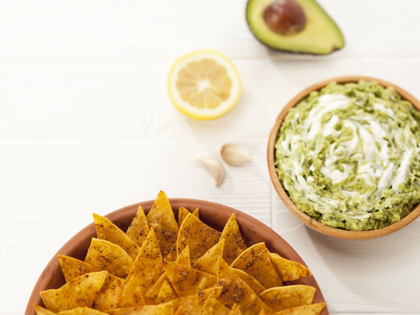 To continue a series of healthy cookbooks, this Creamy Guacamole with Baked Tortilla Chips - part of Healthy Family Recipes cookbook -  is a lower fat, lower sodium combination with a ton of essential fatty acids, calcium and magnesium.