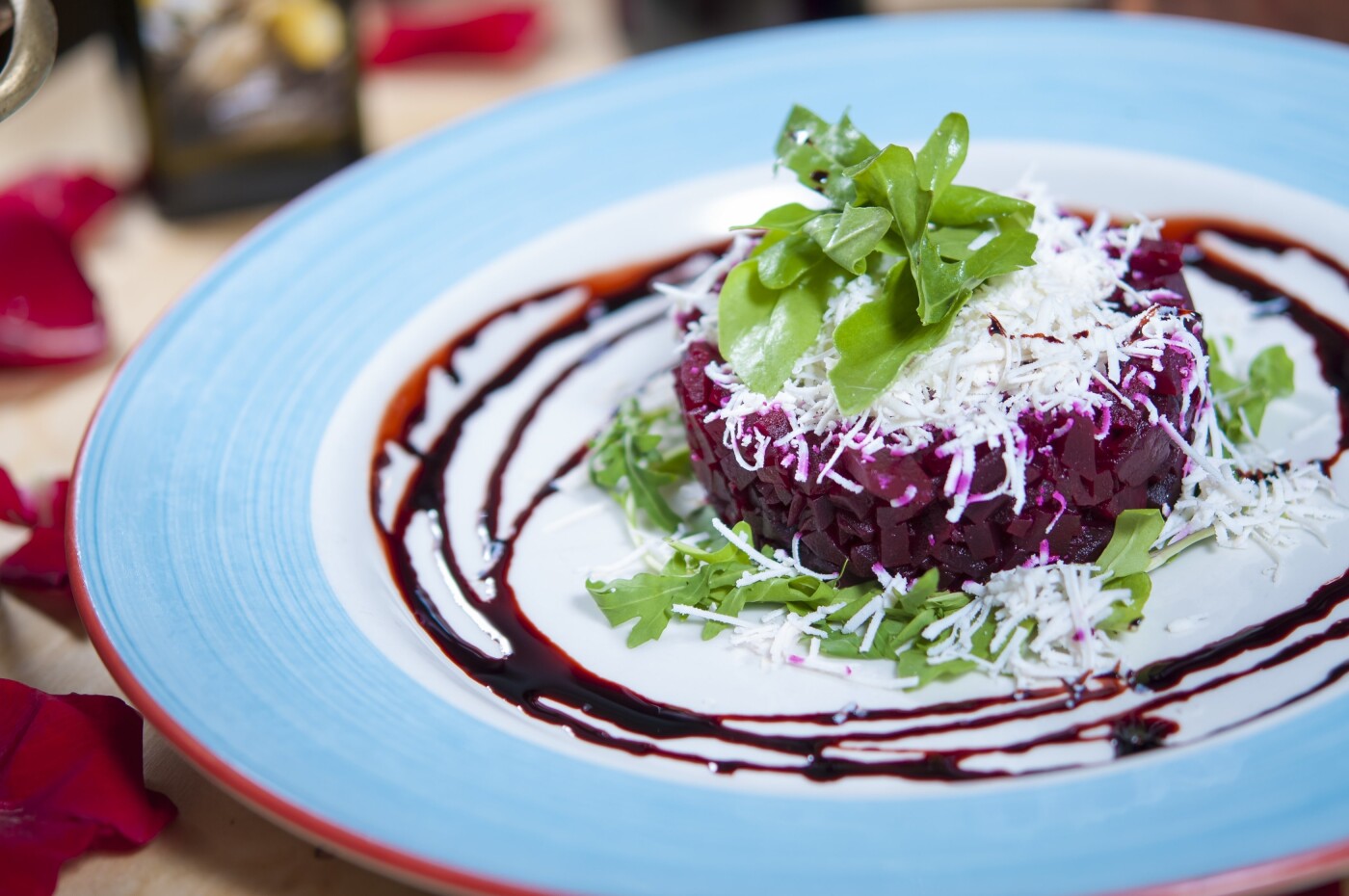 This is an image of an interesting beet tartare dish that I shot for a small Italian restaurant in South Miami. It's made with oven roasted beets, mache greens, and gorgonzola cheese in a champagne vinaigrette. Very tasty and well presented!