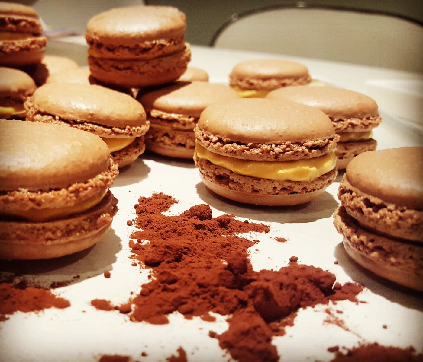 My chocolate and caramel filled macarons were created for my husband. I was making my rasberry Macarons one day when my husband Michael said to me you know what would really be nice,  chocolate and caramel...so i decided to make them for him. So instead of using rasberry puree I changed it up and used cocoa powder in it's place. The caramel I made from scratch. They were a huge hit with my hubby and his work mates. These are his favorite!!