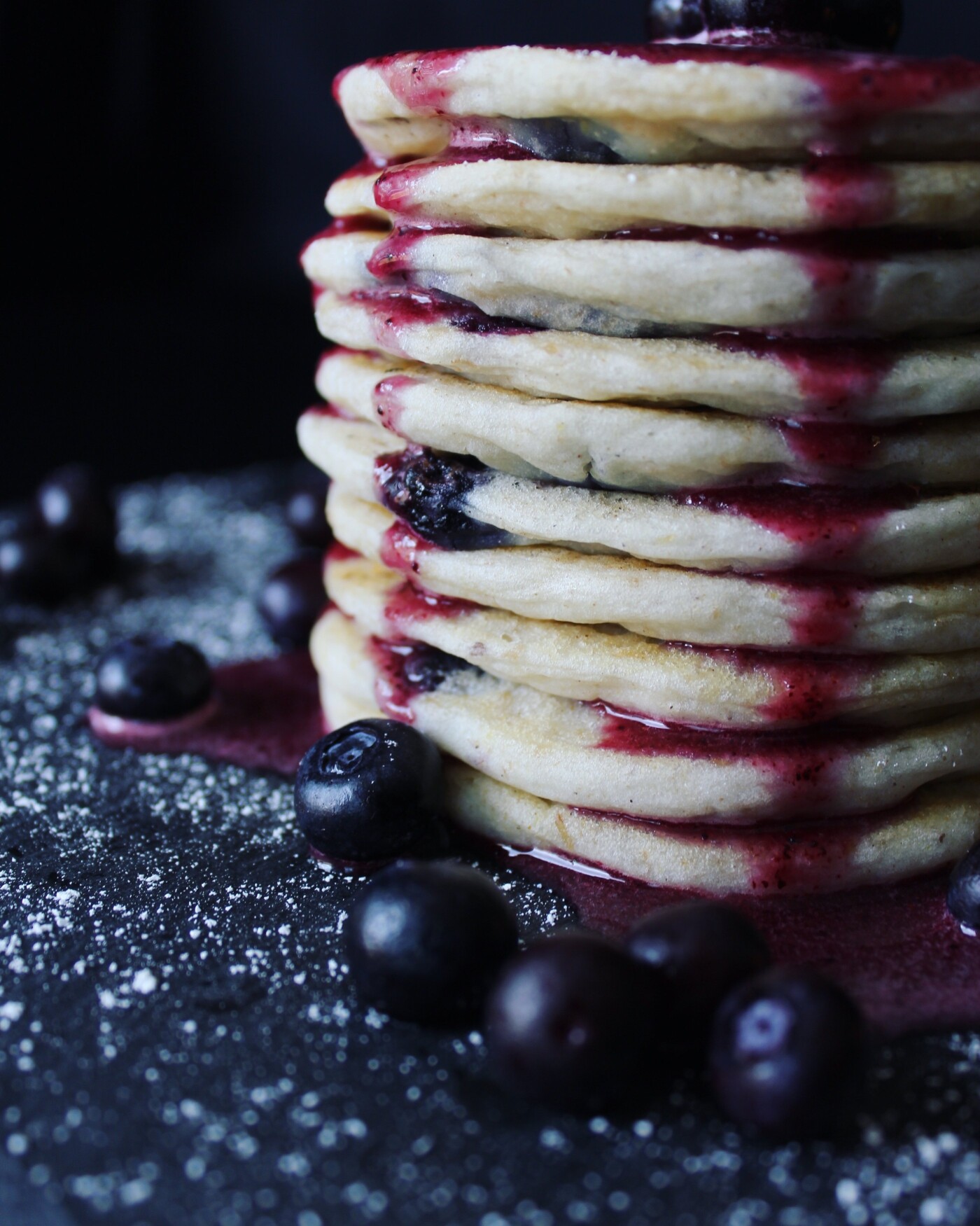 These pancakes were made on a Saturday morning just after I visited a farmers market. I was able to get my hands on some of the freshest blueberries. I thought the perfect way to use the blueberries would be to fold them into a creamy batter and create fluffy pancakes with them. This was my end result, a buttery, delicate, and sweet stack of fresh homemade blueberry pancakes. Before I knew it, all that remained on my plate was dribbles of syrup. 