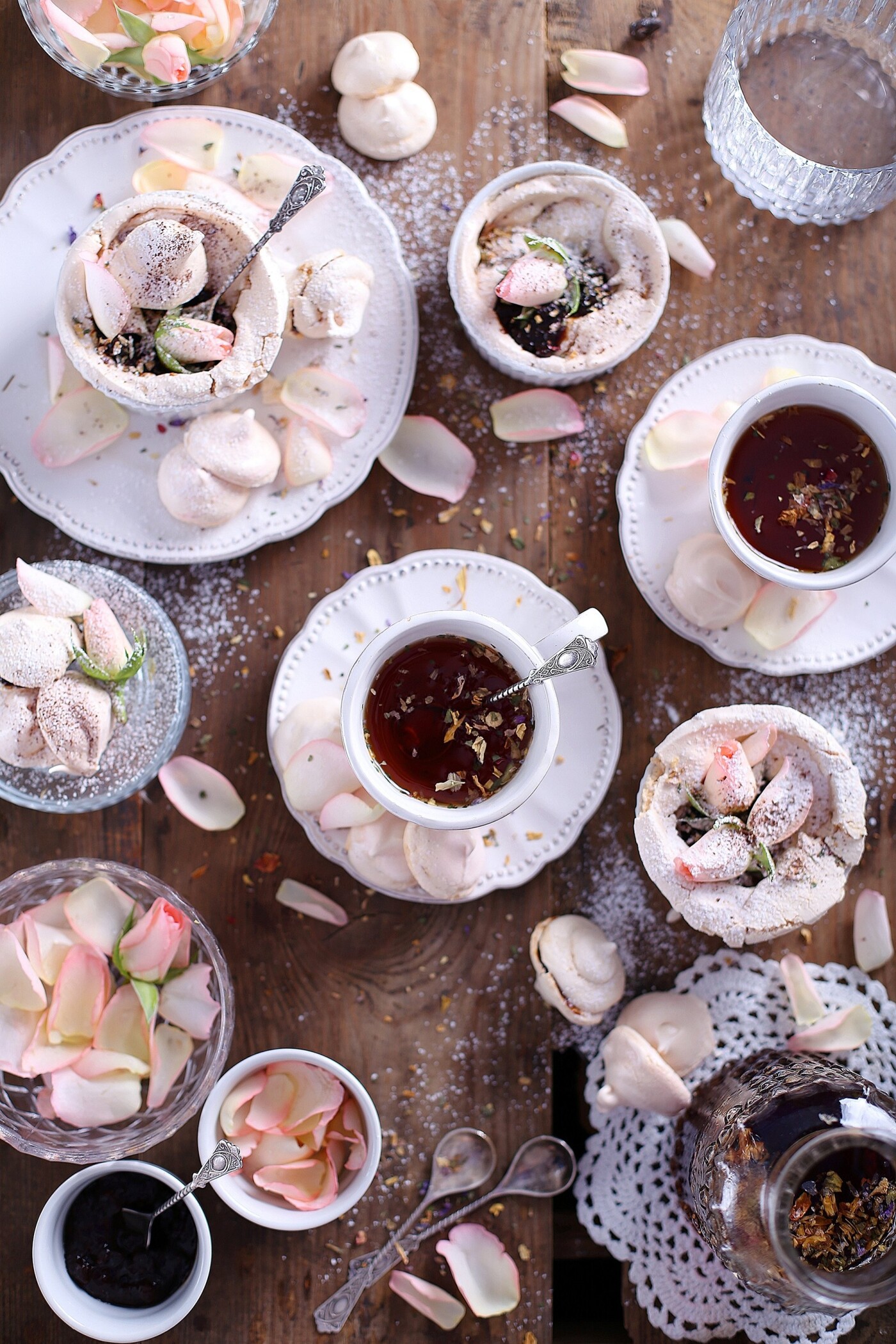Just a cup of tea presented in some sort of pleasing way. Although, tea with edible flowers plus meringue cookies with rose petals ganache make a great combination of flavours! <br />
The idea was simply to create a lovely atmosphere.