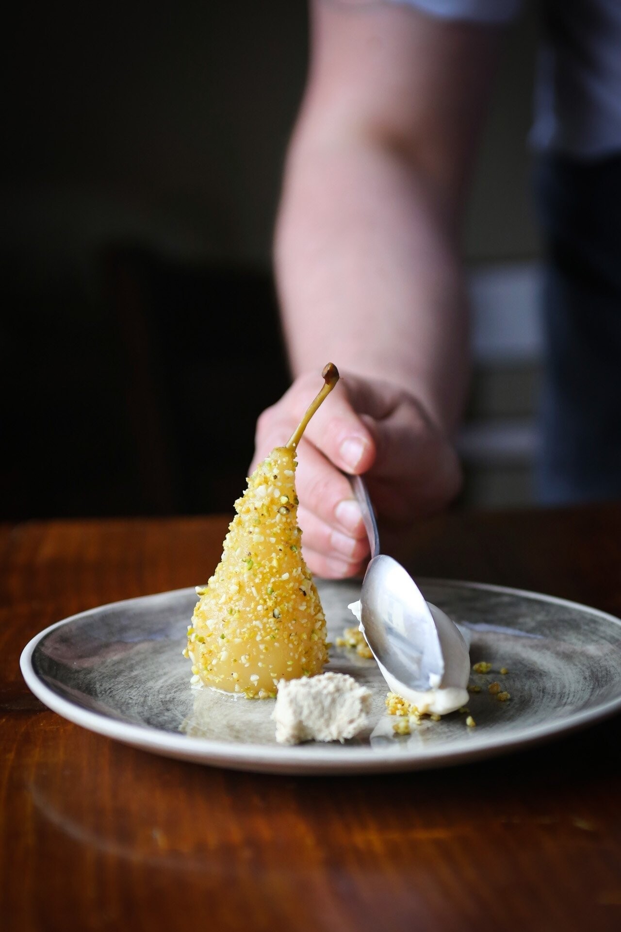 I work with natural light and a documentary approach to all my food photography, so this image was captured in realtime, as Chef Joshua Overington plated his dessert for our photoshoot. His stunning creation is poached pear in a nougatine crust, faisselle normande and Corsican chestnut honey ice cream, for Le Cochon Aveugle in York, UK.  It was delicious!