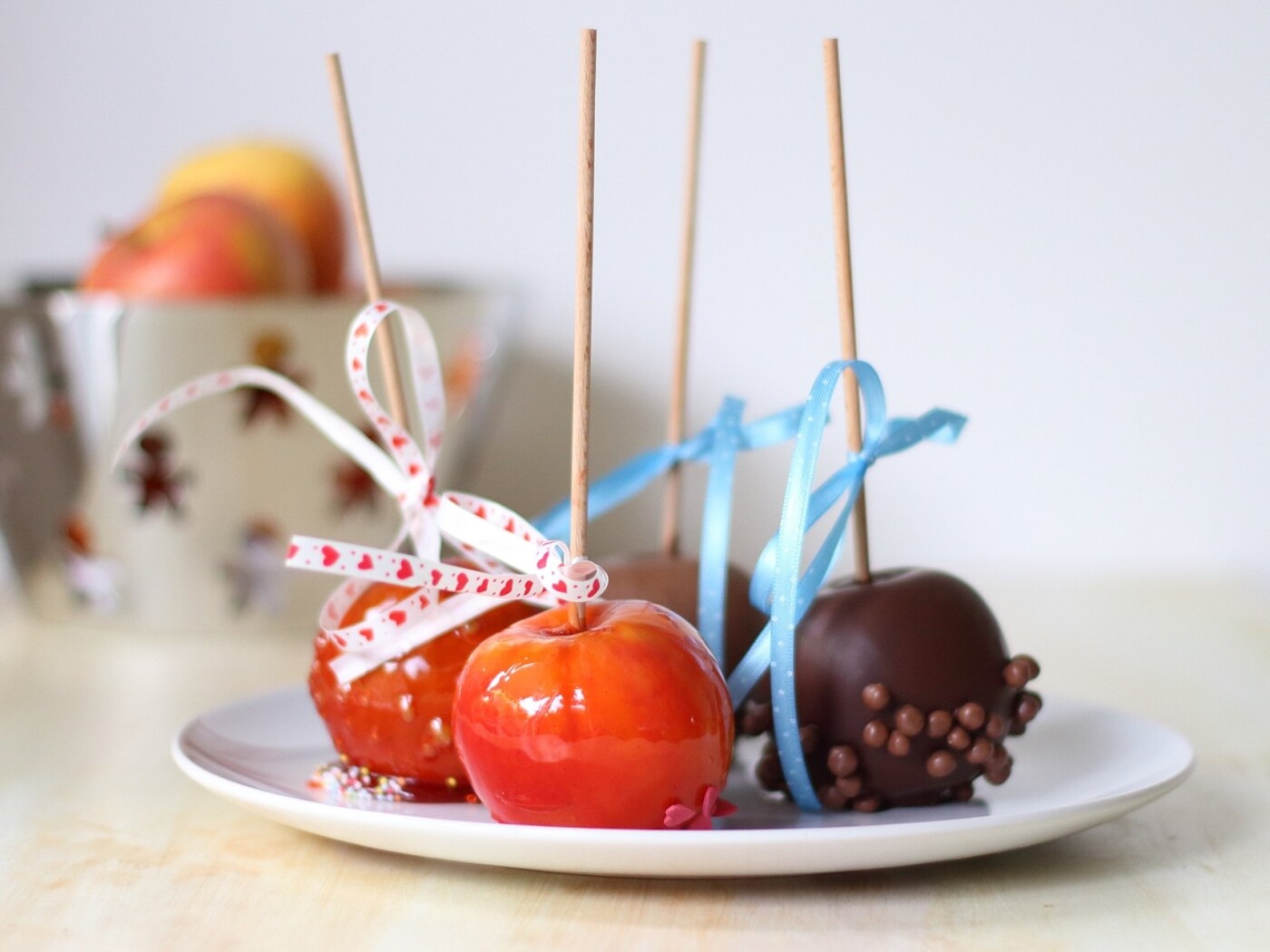 Oktobefest - the world's biggest fair, annually held in Munich - is just around the corner. Get in the mood with these caramel and chocolate covered apples! They are as much fun to make as to eat!