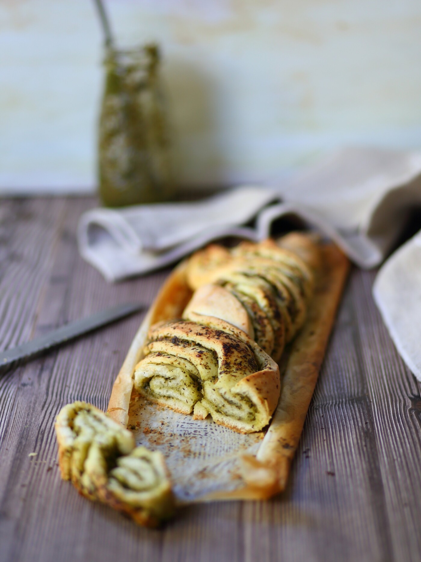 I am addicted to basil pesto - so I had to try this delicious braided pesto bread. There's nothing like a fresh warm bread, and I love the beautiful braids and striations. 