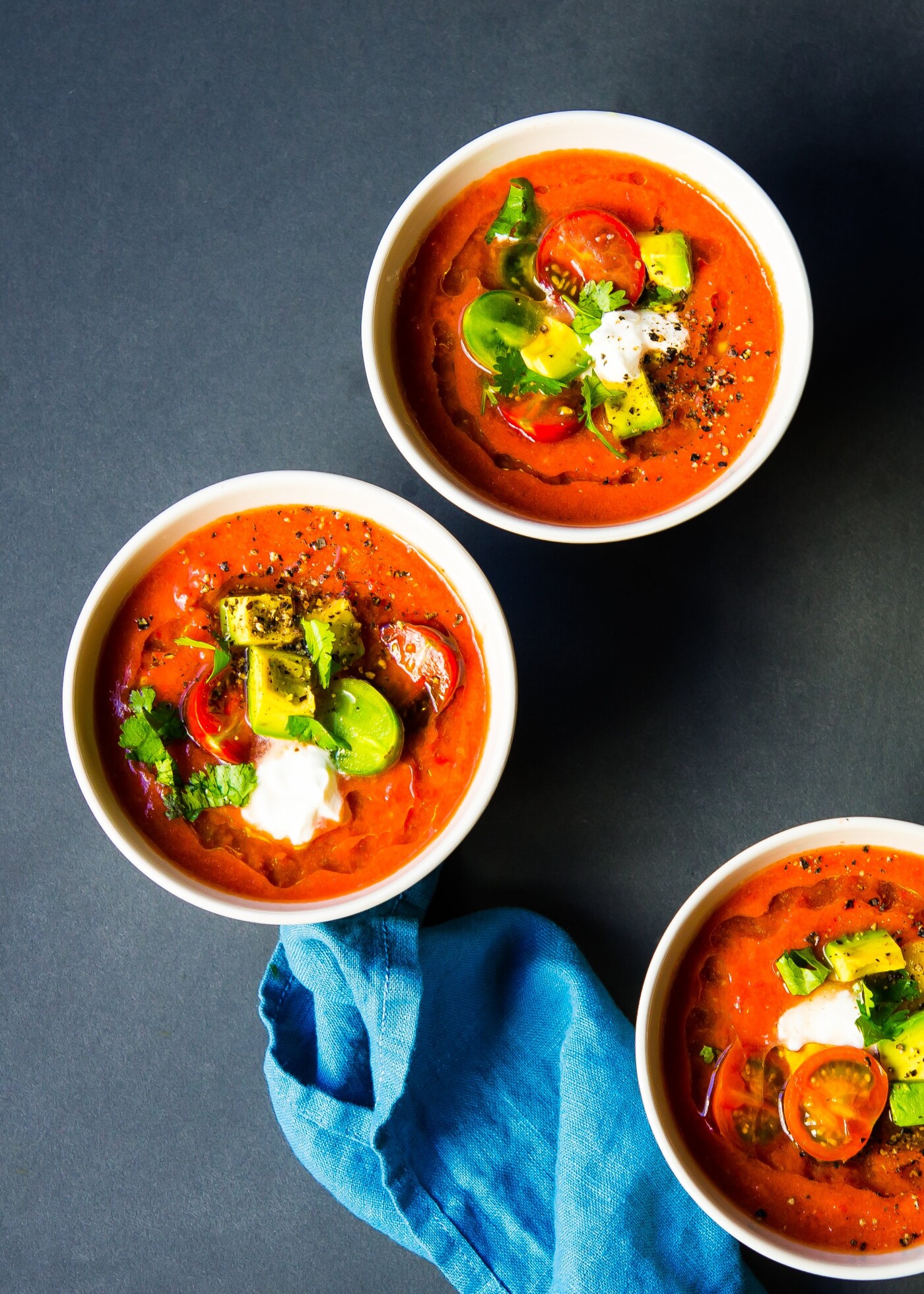 As last days of summer coming to an end, this chilled heirloom tomato gazpacho soup with olive oil, red wine vinegar, sweet onions, garlic cloves, jalapeño and ground coriander leaves one with a refreshing memory of the season.  Its vibrant color and creamy texture capture the essence of summer so well!