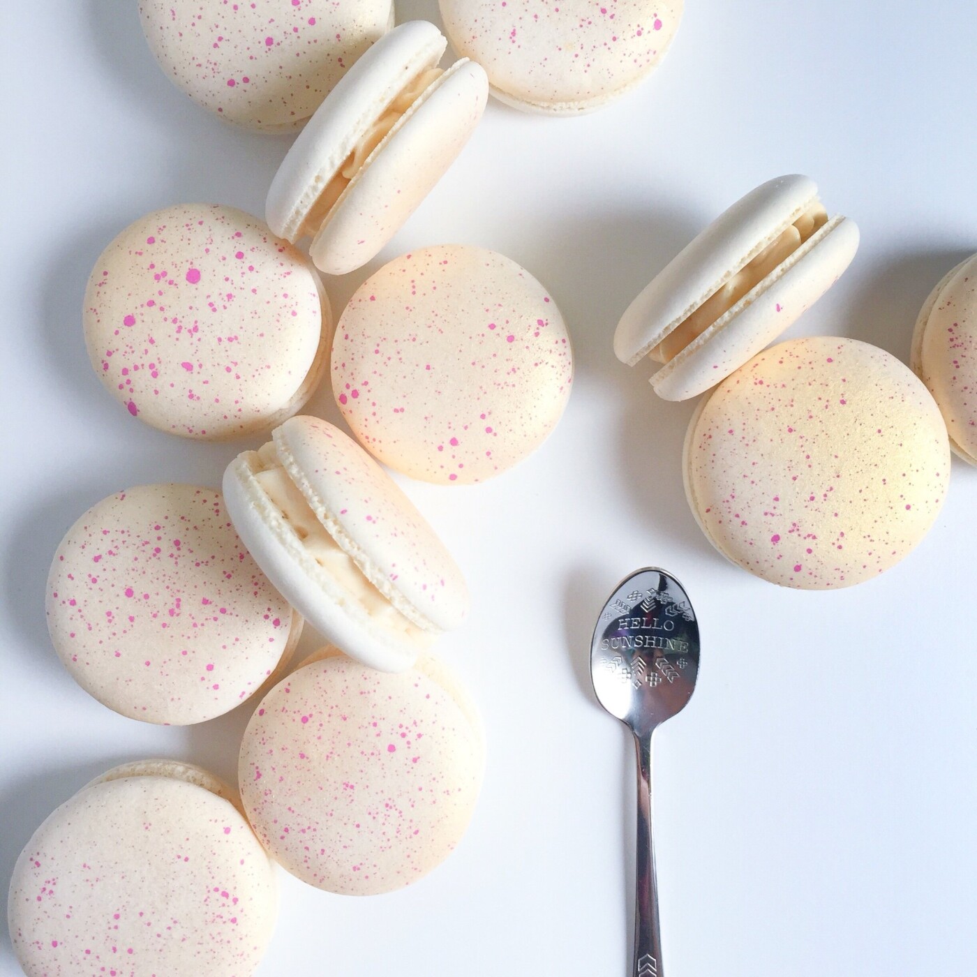 Hand painted lemon and vanilla macarons with gold and pink for a babyshower. That spoon is one of my favorite photography props!
