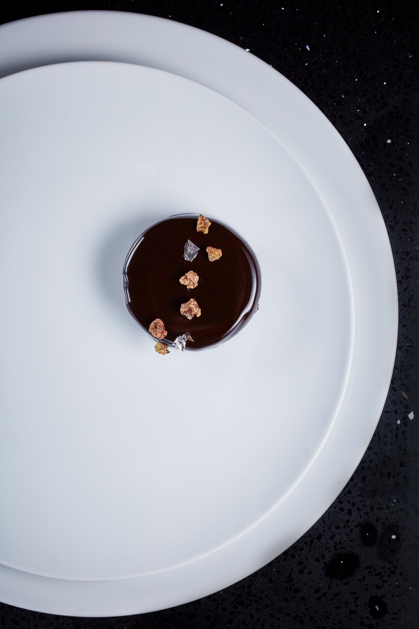 This was taken with executive pastry chef Andy Blas - such a simple, elegant chocolate torte with all the beautiful embellishment of silver leaf and nuts.<br />
<br />
It was for a commission by the wonderful Seasoned by Chefs magazine who I love shooting for.<br />
<br />
