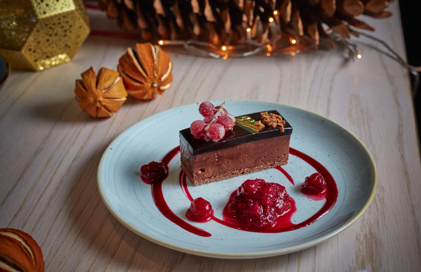 Chocolate on chocolate with sugared berries and compote - lovely velvety textures added to a lovely Christmas setting.<br />
<br />
Taken at Bronte Restaurant, The Strand @bronte_london<br />
Photographer: @jodihindsphoto