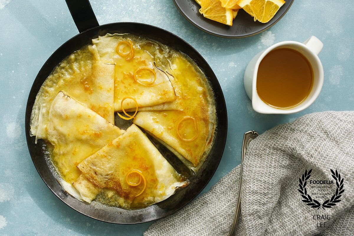 Crepes Suzette recipe photographed for the New York Times  Cooking section @nytfood. A delicious dessert immersed in sweet orangey syrup. Styled by @the_bojon_gourmet and @snixykitchen.
