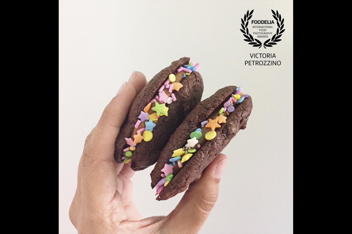 Brownie cookie sandwiches with dulce de leche filling and sprinkles, because life with sprinkles is always better! I always like how a "human" component adds life to a picture so I'm always trying to incorporate my hands when I'm taking pictures of my products!