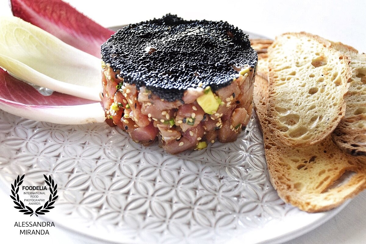 Hummm!!! This is one of my favorite dishes in my restaurant! Asian tuna tartare; with avocado, ginger, wasabi, sesame seeds, red onion and caviar in top! The flavors are so well balanced, it's hard to stop eating. <br />
Restaurant: La Contessa -Carpaccio House<br />
