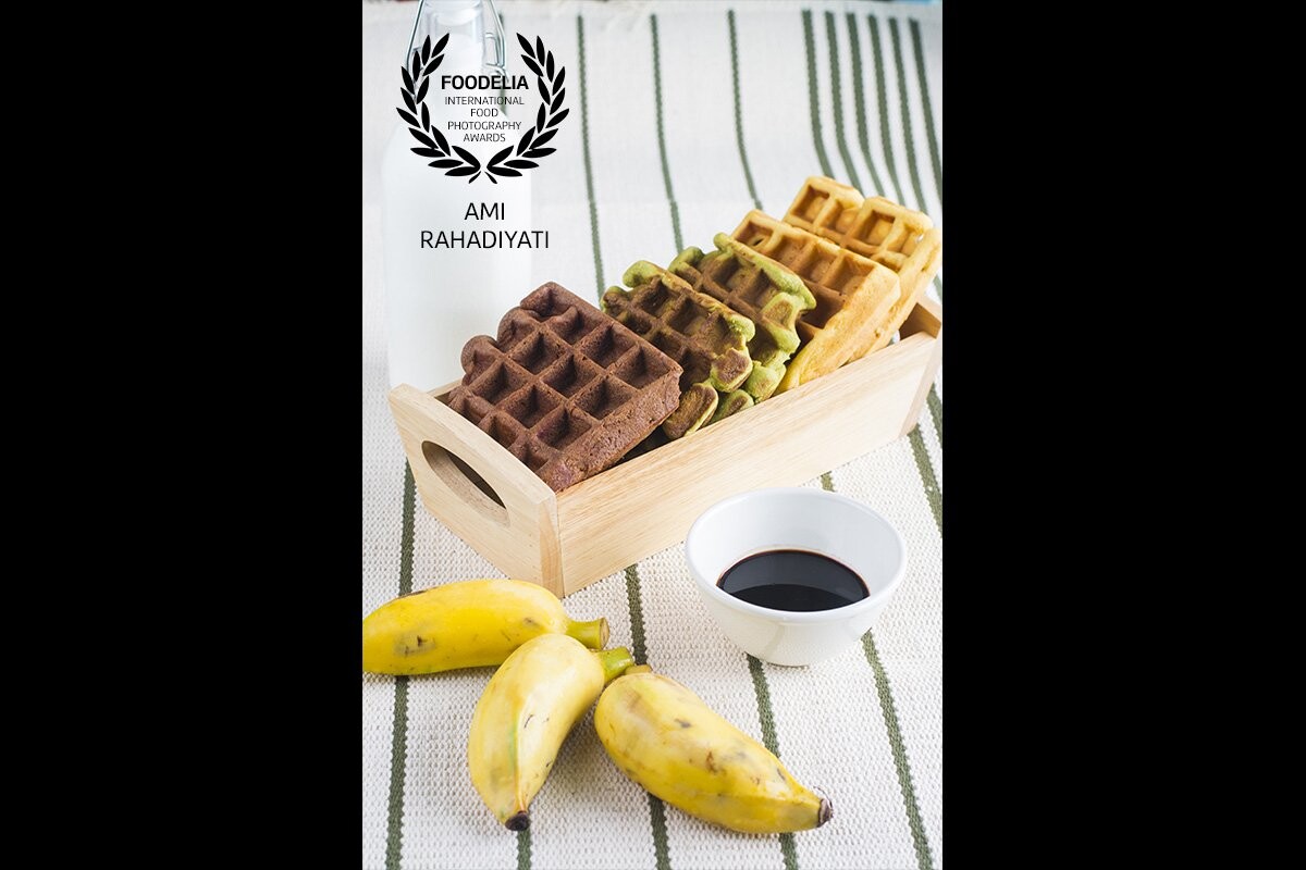 This is a photo capture of one of the meals I like to have for breakfast. Yummy waffles, chocolate syrup/dip, milk, and bananas. Something simple and easy to make yet definitely makes my day and my tummy happy. 